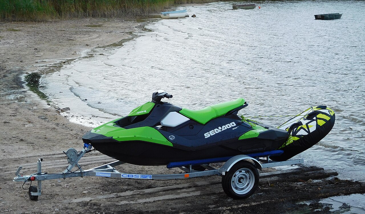 A Sea-Doo Spark on a trailer by the water